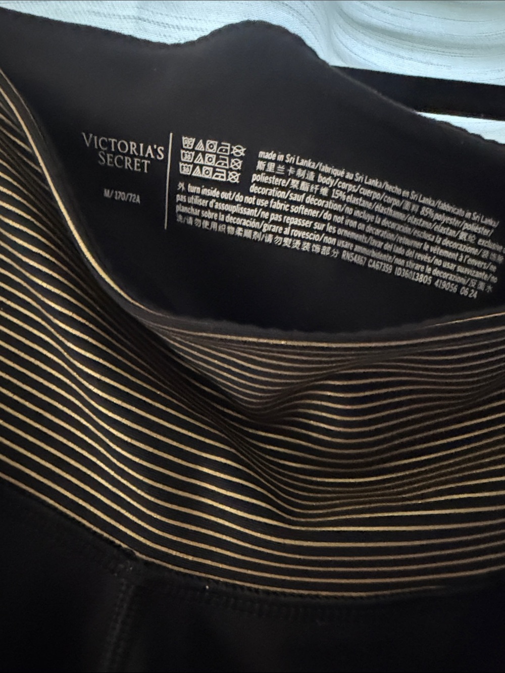 Victoria's Secret Black leggings with Subtle Gold Stripe Accents - Picture 4 of 5
